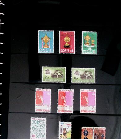 BADMINTON: Specialised collection in four deluxe albums with vignettes, cancellations, postcards, etc. very fine