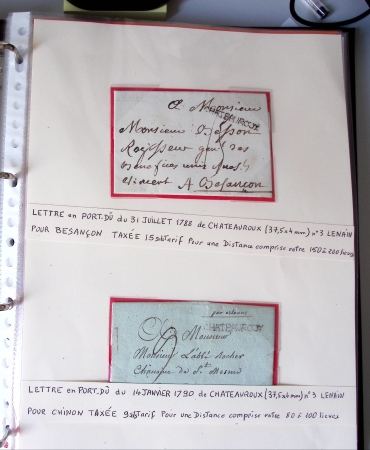 Bel album brun simili-cuir Leuchtturm avec boitier contenant 37 marques postales de Chateauroux + 6 décrets et documents dont plis de la Révolution Française. A étudier. TB