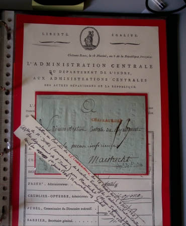 Bel album brun simili-cuir Leuchtturm avec boitier contenant 37 marques postales de Chateauroux + 6 décrets et documents dont plis de la Révolution Française. A étudier. TB
