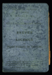 Carnet avec couverture bleue "Brevet licence de pilote d'avion de tourisme" avec sa photo (1930). TB