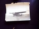 Plusieurs dizaines de photos d'époque, surtout avions dont le Trait d'Union, mais aussi un portrait de Le Brix avec dédicaces de Maryse Bastié et Marcel Reine. TB