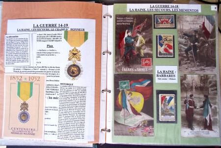 Album vert foncé : la guerre 1914 - 1918 contenant une médaille militaire, 21 CP patriotiques, 17 vignettes livret d'infirmière de l'hopital auxiliaire 101 de Troyes, 3 boutons militaires, 2 rares cartes postales de f