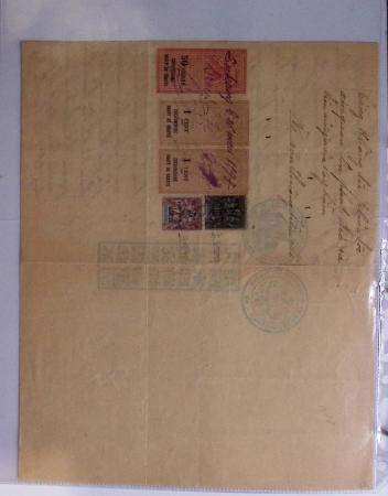 Dans un classeur bleu "exacompta" : timbres fiscaux de Cochinchine-taxes régionales Saïgon-Cholon sur 12 documents d'état-civil en matière indigène