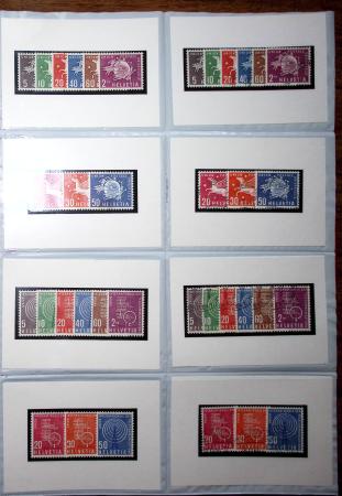1860-1990 Small all-world estate in seven stockbooks