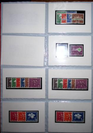 1860-1990 Small all-world estate in seven stockbooks