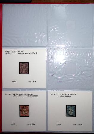 1860-1990 Small all-world estate in seven stockbooks