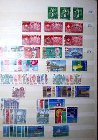 1860-1990 Small all-world estate in seven stockbooks