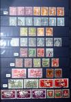1850-1974 Collection de neufs et d'oblitérés en quatre