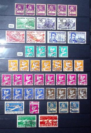 1850-1974 Collection de neufs et d'oblitérés en quatre