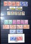 1850-1974 Collection de neufs et d'oblitérés en quatre