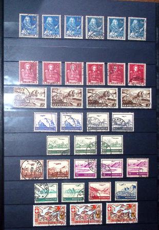 1850-1974 Collection de neufs et d'oblitérés en quatre