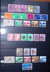 1850-1974 Collection de neufs et d'oblitérés en quatre