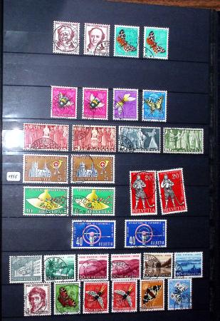 1850-1974 Collection de neufs et d'oblitérés en quatre