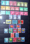 1850-1974 Collection de neufs et d'oblitérés en quatre