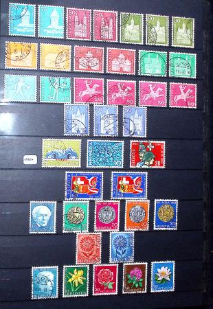 1850-1974 Collection de neufs et d'oblitérés en quatre