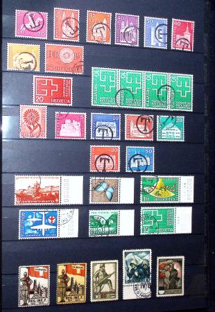 1850-1974 Collection de neufs et d'oblitérés en quatre