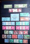 1850-1974 Collection de neufs et d'oblitérés en quatre