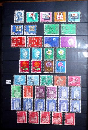 1850-1974 Collection de neufs et d'oblitérés en quatre