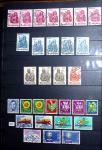 1850-1974 Collection de neufs et d'oblitérés en quatre