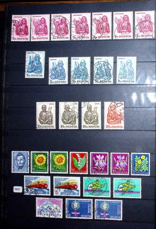 1850-1974 Collection de neufs et d'oblitérés en quatre