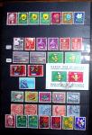 1850-1974 Collection de neufs et d'oblitérés en quatre