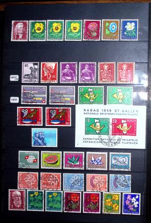 1850-1974 Collection de neufs et d'oblitérés en quatre