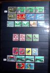 1850-1974 Collection de neufs et d'oblitérés en quatre