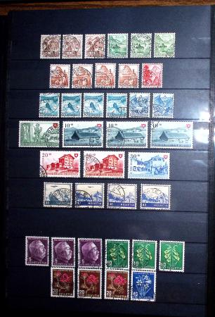 1850-1974 Collection de neufs et d'oblitérés en quatre