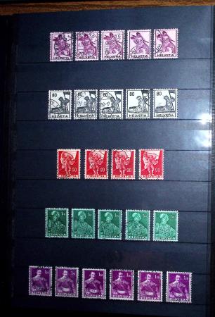 1850-1974 Collection de neufs et d'oblitérés en quatre