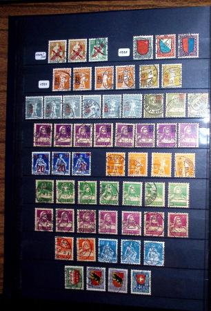 1850-1974 Collection de neufs et d'oblitérés en quatre