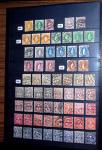 1850-1974 Collection de neufs et d'oblitérés en quatre