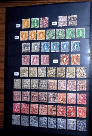 1850-1974 Collection de neufs et d'oblitérés en quatre