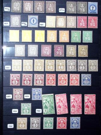 1850-1974 Collection de neufs et d'oblitérés en quatre