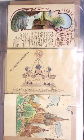 Album noir contenant 160 entiers cartes postales étrangères avec illustrations dessinées ou peintes à la main dont Autriche (10) - Allemagne (63) - Sarre (1) - Suisse (24) - Belgique (9) - Portugal (3) - Danemark (1)