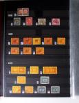 1859-1940, Ensemble de neufs et d'obl. en 19 classeurs