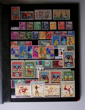 1859-1940, Ensemble de neufs et d'obl. en 19 classeurs