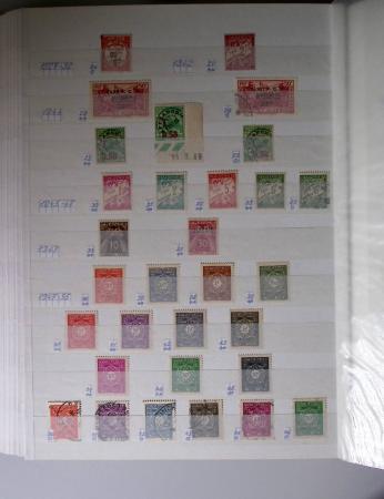 1859-1940, Ensemble de neufs et d'obl. en 19 classeurs