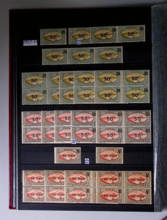 1859-1940, Ensemble de neufs et d'obl. en 19 classeurs