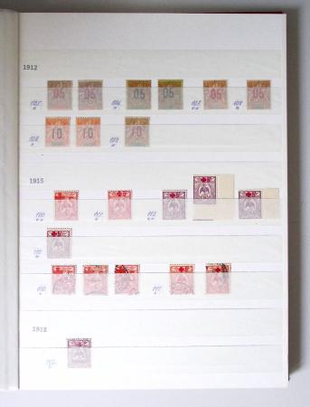 1859-1940, Ensemble de neufs et d'obl. en 19 classeurs