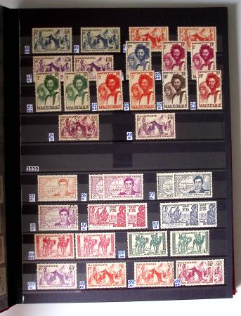 1859-1940, Ensemble de neufs et d'obl. en 19 classeurs