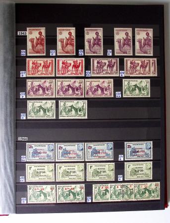 1859-1940, Ensemble de neufs et d'obl. en 19 classeurs