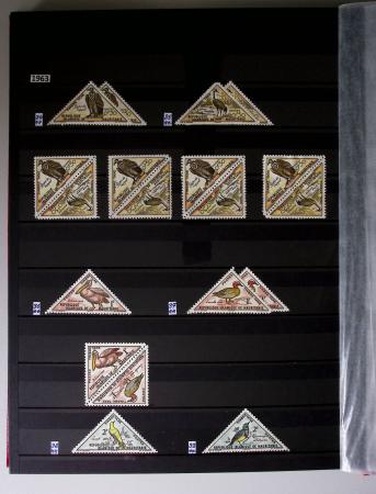 1859-1940, Ensemble de neufs et d'obl. en 19 classeurs