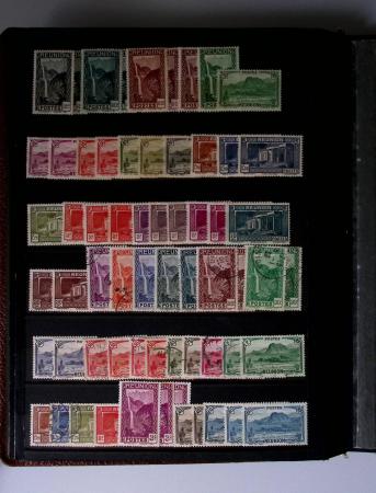 1859-1940, Ensemble de neufs et d'obl. en 19 classeurs