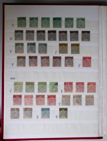 1859-1940, Ensemble de neufs et d'obl. en 19 classeurs