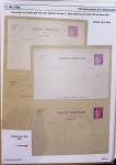 Gros classeur blanc de bureau contenant une collection spécialisée d'entiers postaux au type Paix 40c violet, 50c rouge, 55c violet, 65c Outremer, 90c
