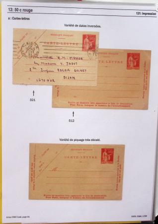 Gros classeur blanc de bureau contenant une collection spécialisée d'entiers postaux au type Paix 40c violet, 50c rouge, 55c violet, 65c Outremer, 90c