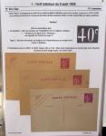 Gros classeur blanc de bureau contenant une collection spécialisée d'entiers postaux au type Paix 40c violet, 50c rouge, 55c violet, 65c Outremer, 90c