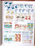 1900-1959, en 5 albums, très important stock de timbres
